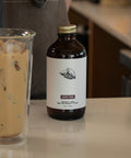 Another lifestyle shot featuring Pax & Beneficia Sugar-Free Cardamom syrup